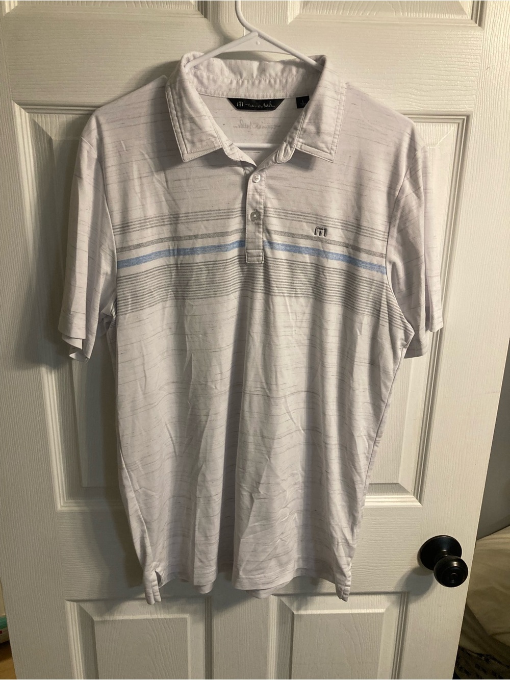 Travis Mathew White Polo with Light Blue and Gray Stripes